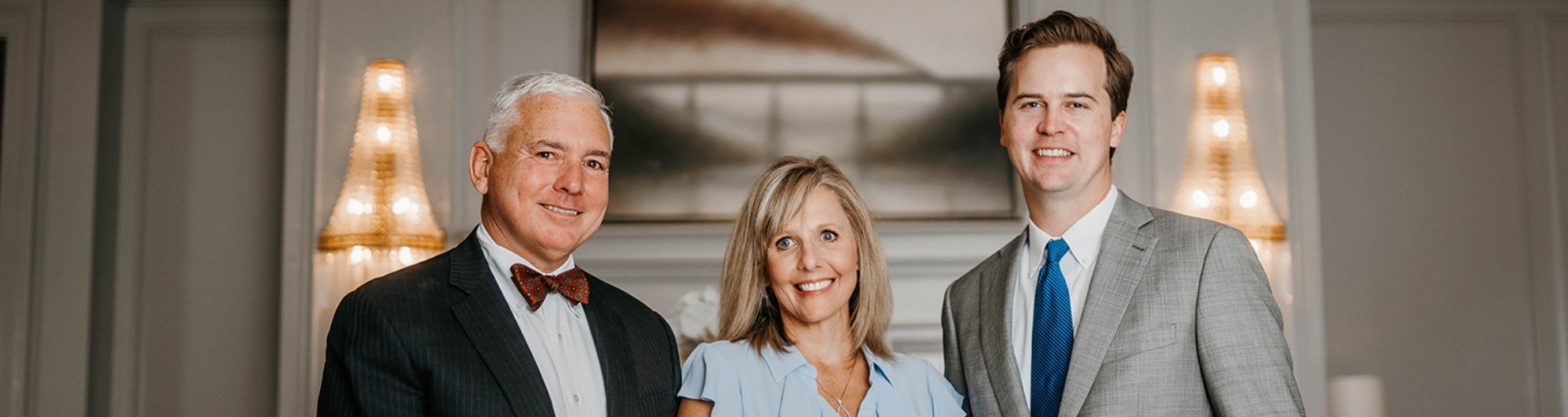 From left to right: Bill Wade, Branch Manager, Senior Vice President/Investments. Stacie Wegman, Client Relationship Manager, Reid Barry, Associate Vice President/Investments